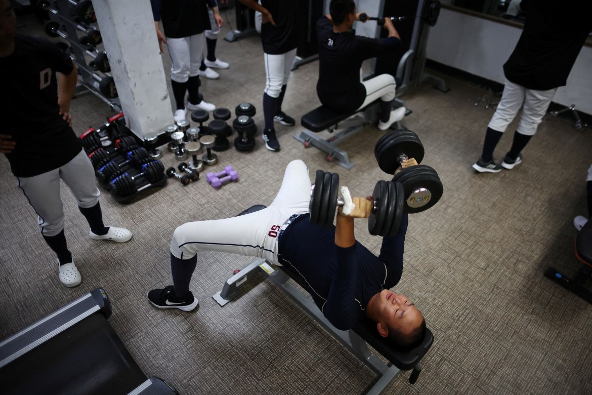 An Seung-han, 17, a member of the Deokjeok High School baseball team, works out during a practice session on Deokjeok island in Incheon, South Korea.