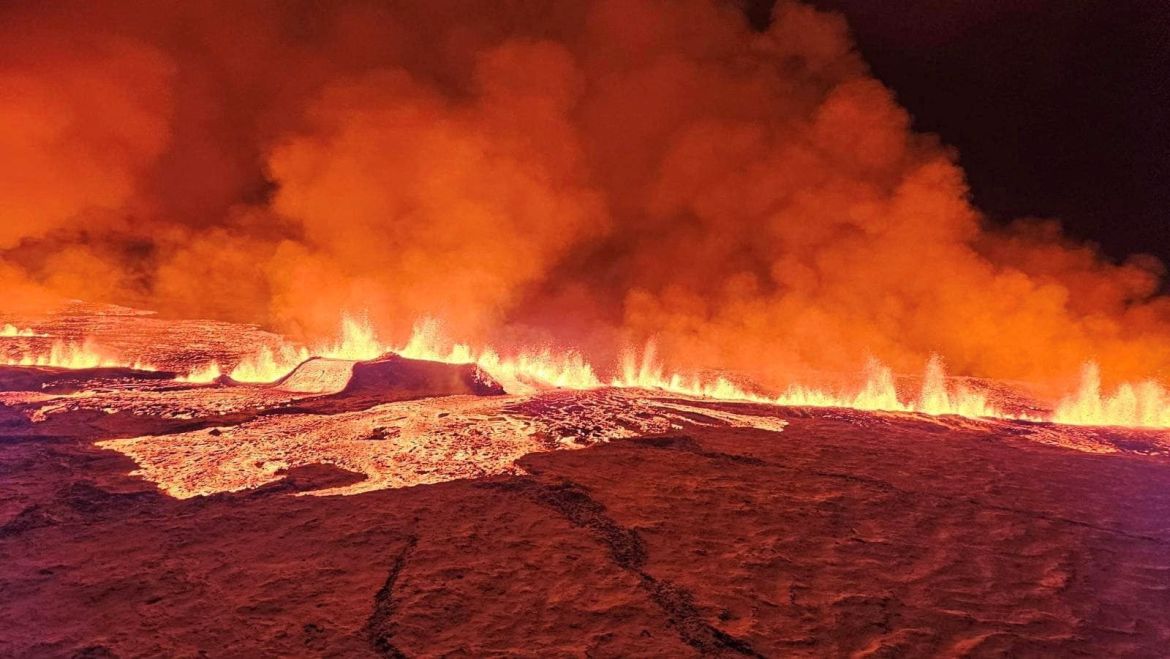 A volcano spews lava and smoke as it erupts in Grindavik, Iceland
