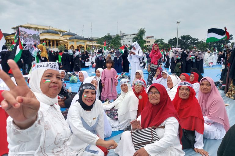 Indonesian homemakers have been front and centre in protests such as this one, in Medan, North Sumatra, against Israel's war on Gaza, in early December 2023 [Aisyah Llewylln/Al Jazeera]