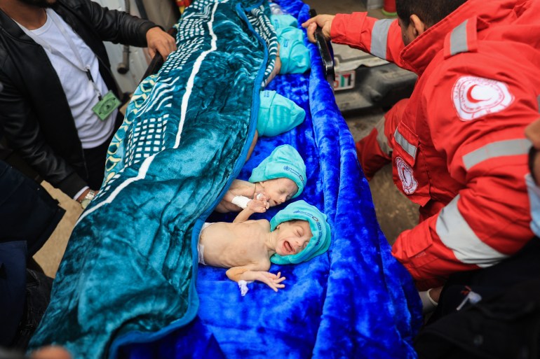 Palestinian medics prepare premature babies, evacuated from Gaza City's Al Shifa hospital, for transfer from a hospital in Rafah in the southern Gaza Strip to Egypt.