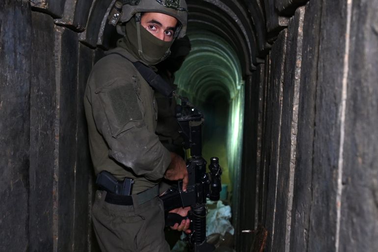 An Israeli soldier in a tunnel under Gaza City,