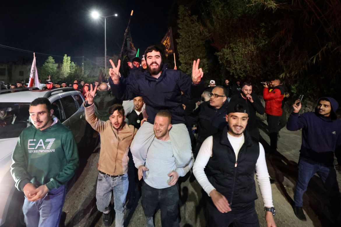 A newly released prisoners is carried by supporters during a welcome ceremony following the release of Palestinian prisoners from Israeli jails.