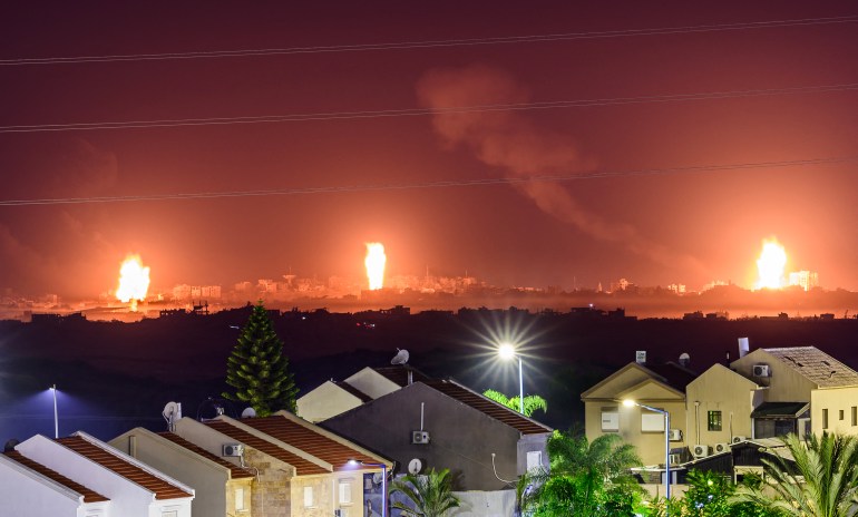 3 fires can be seen on the skyline at night