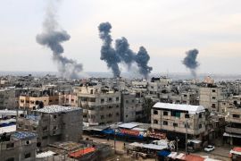 A picture taken on December 20, 2023, from Rafah shows smoke billowing after Israeli strikes over the Nuseirat refugee camp in the central Gaza Strip, amid ongoing battles between Israel and the militant group Hamas.