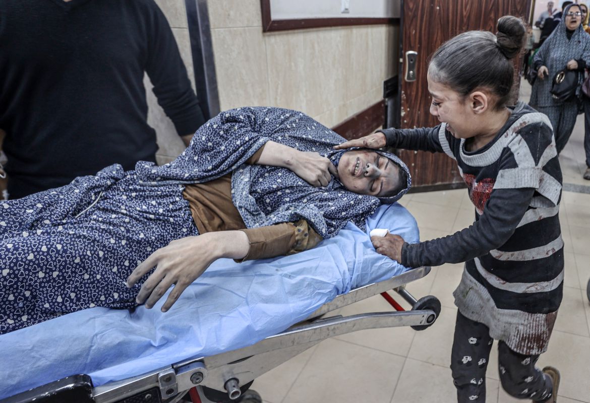 Image depicts graphic content) Injured people, including children, are brought to Al-Aqsa Martyrs Hospital for treatment after an Israeli attack at the end of the humanitarian pause between Israel and Hamas in Deir al-Balah, Gaza on December 02
