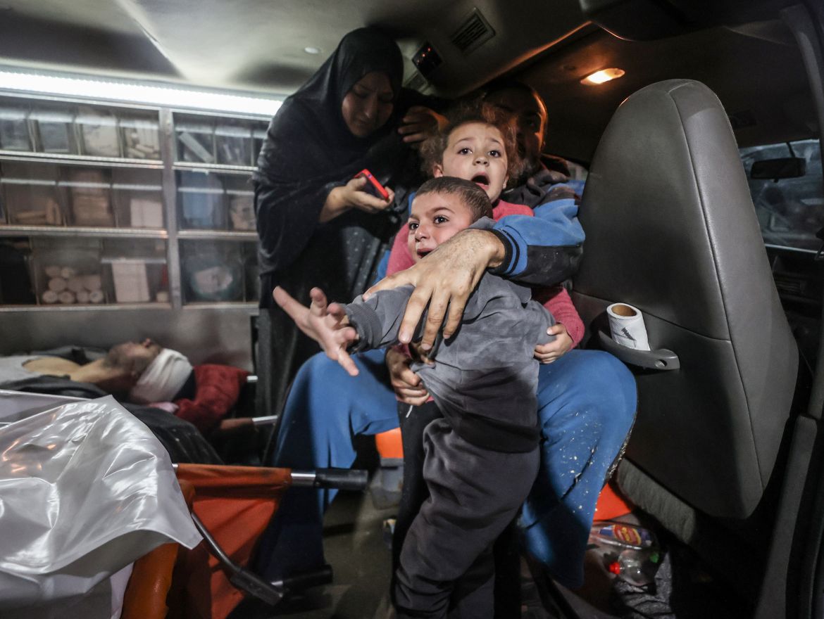 Palestinian children are taken to the Al-Aqsa Martyrs Hospital as Israeli attacks continue in Deir al-Balah, Gaza.