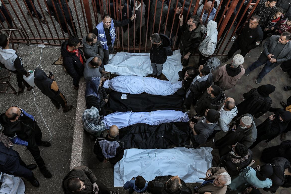 Relatives of the Palestinians died in Israeli attacks, mourn as they receive the dead bodies from the morgue of An-Najjar Hospital for a funeral ceremony while the Israeli attacks continue in Rafah, Gaza.