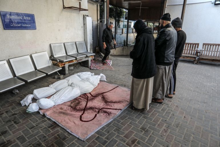 Palestinians perform funeral prayer at Nasser Hospital after their relatives lost their lives in Israeli attacks in Rafah, Gaza.