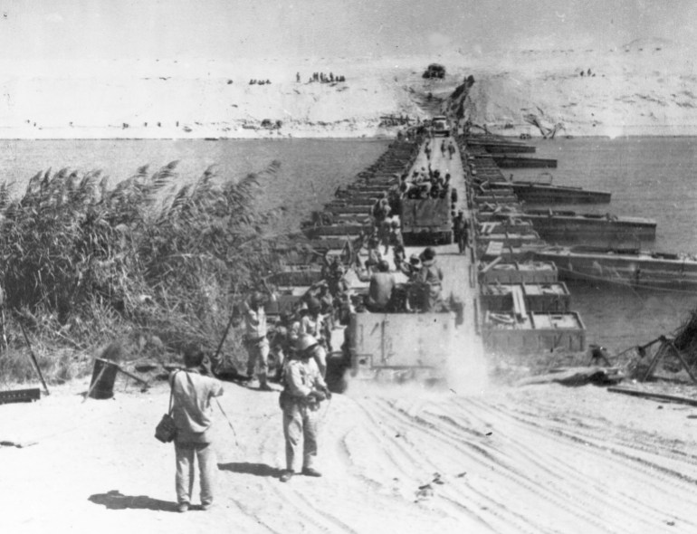 Egyptian troops cross the ceasefire line by a pontoon bridge across the Suez Canal, Egypt, October 8, 1973