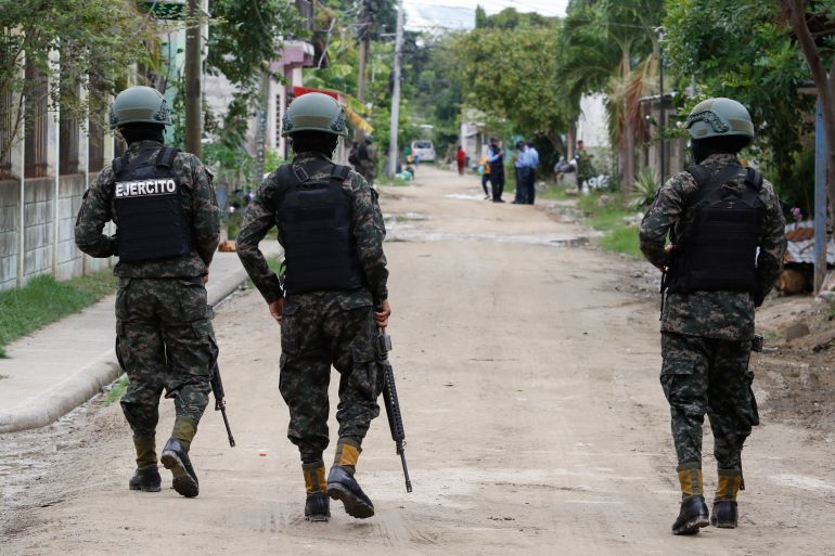 FILE - Soldiers patrol the Riviera Hernandez neighborhood in San Pedro Sula, Honduras, June 27, 2023. President Xiomara Castro took office in 2022 as the first female president of Honduras, winning on a message of tackling corruption, inequality and poverty, and has sought to mimic neighboring El Salvador's crackdown on gangs. (AP Photo/Delmer Martinez, File)