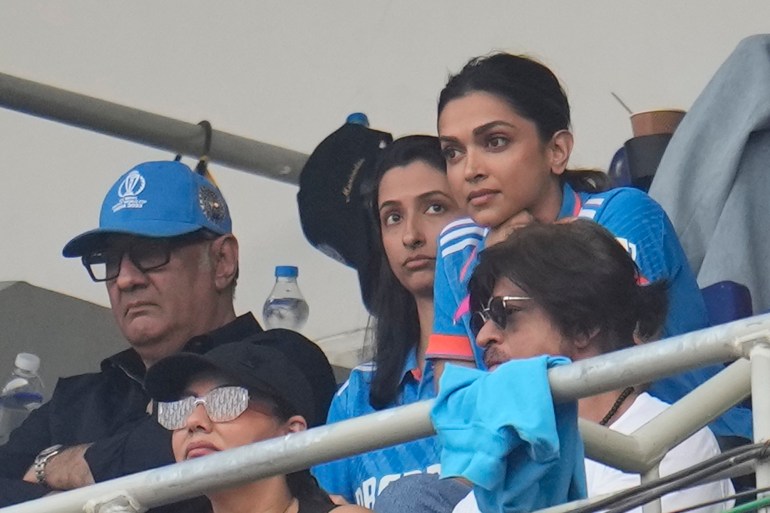 Bollywood actor Deepika Padukone and Shah Rukh Khan watch the ICC Men's Cricket World Cup final match between India and Australia in Ahmedabad, India