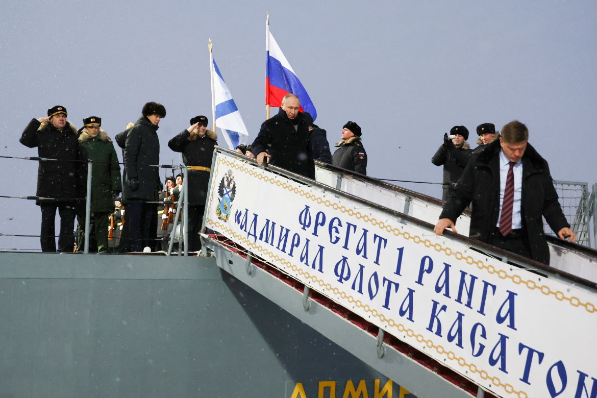 Putin walking down a gang-plank during his trip to Severodvinsk in Russia's Archangelsk region