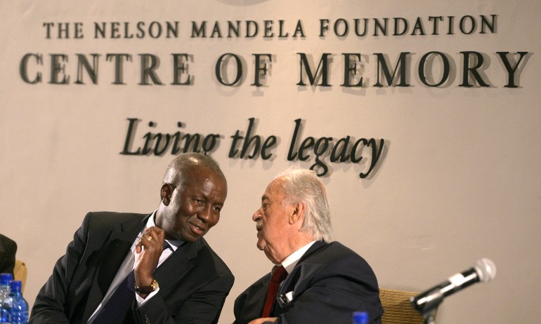 Dikgang Moseneke (L) and George Bizos (R), executors of the Nelson Mandela estate