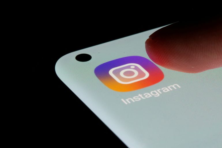 FILE PHOTO: Instagram app is seen on a smartphone in this illustration taken, July 13, 2021. REUTERS/Dado Ruvic/Illustration/File Photo