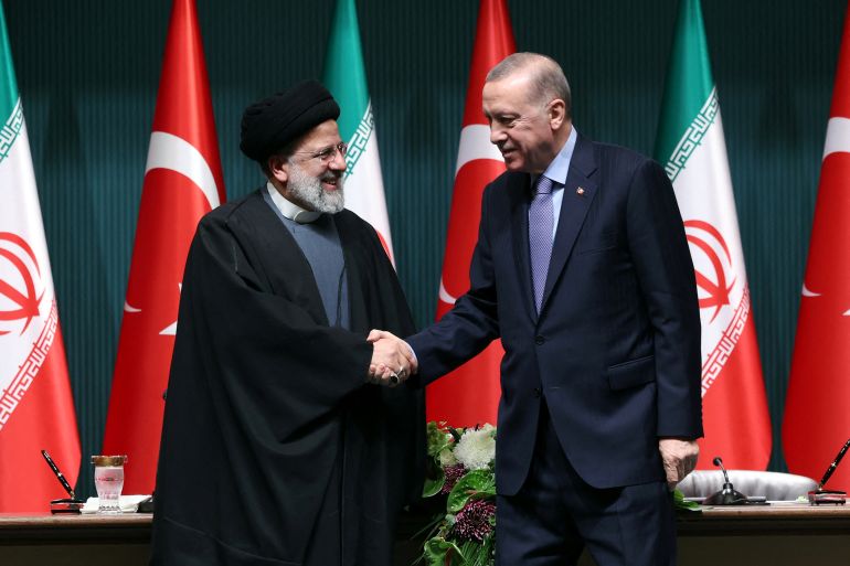 Turkey's President Tayyip Erdogan and Iran's President Ebrahim Raisi