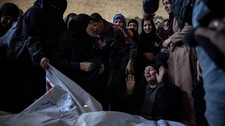 Members of the Abu Sinjar family mourn their relatives killed in the Israeli bombardment of the Gaza Strip, at their house in Rafah, southern Gaza, on January 5, 2024.
