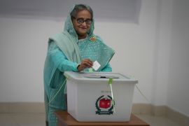 Bangladesh Prime Minister Sheikh Hasina casts her vote in Dhaka, Bangladesh.