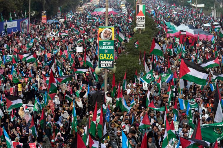Supporters of Jamaat-e-Islami chant slogans during a protest against Israeli airstrikes and to show solidarity with Palestinian people living in Gaza, in Karachi, Pakistan, Sunday, Jan. 14, 2024. (AP Photo/Fareed Khan)