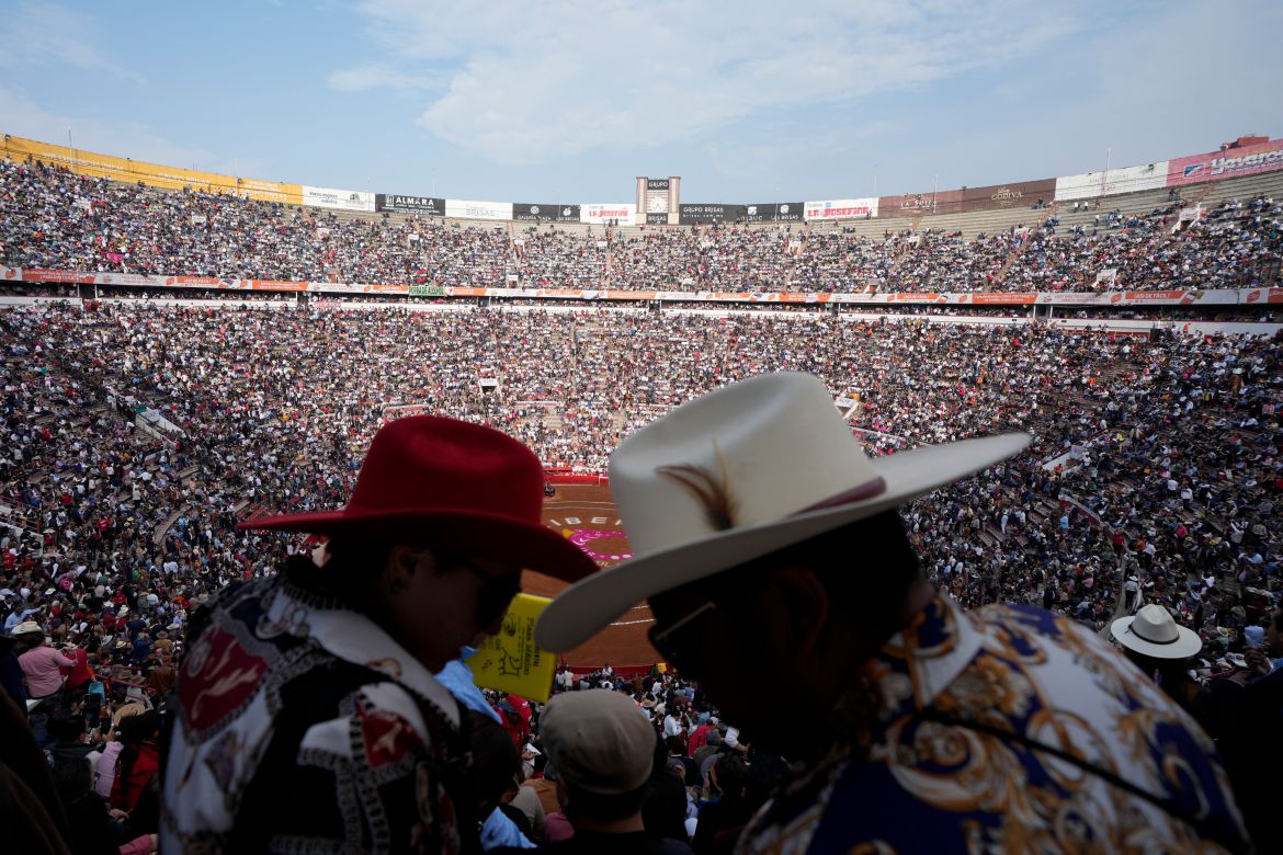 Spectators wait for a bullfight at the Plaza Mexico