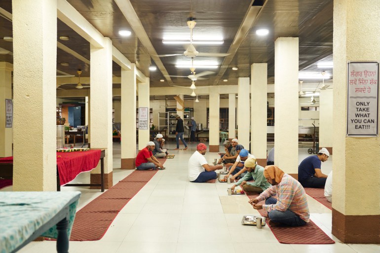 The main dining hall at the Khalsa Diwan Sikh Temple in Manila, Philippines [Sonny Thakur/Al Jazeera]