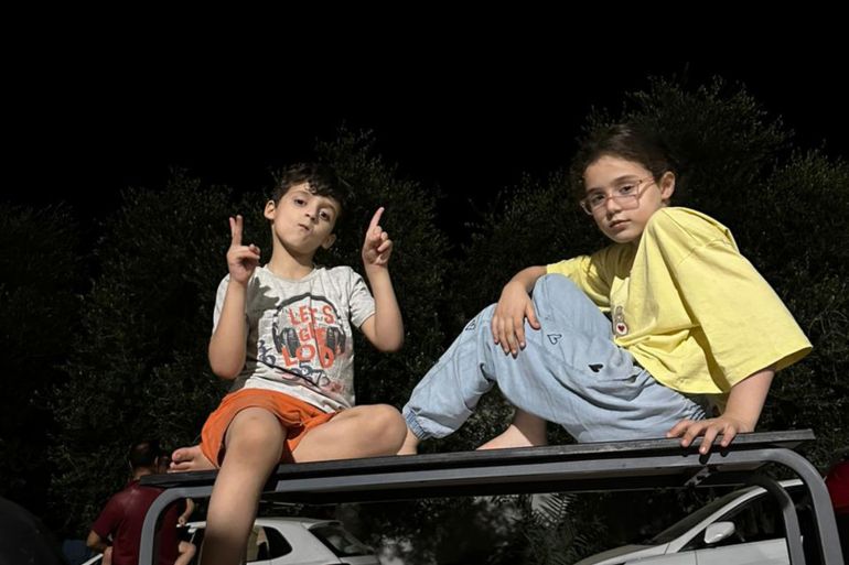Hussein Owda's children Mahmoud, left, and Lin, right, in the early days of the family's displacement [Courtesy of Hussein Owda]