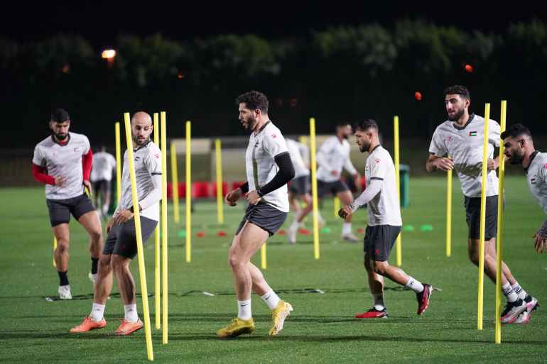 Palestinian football players training after they made history taking their national team to the knock-off stage of the AFC Asian Cup