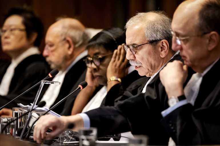 Nawaf Salam (2-R), President of the Court, presides over a hearing at the International Court of Justice (ICJ) in The Hague