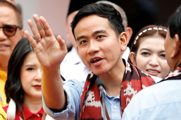 Indonesian vice-presidential candidate Gibran Rakabuming Raka, waves to the crowd