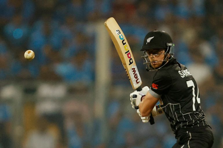 Mitchell Santner playing for New Zealand