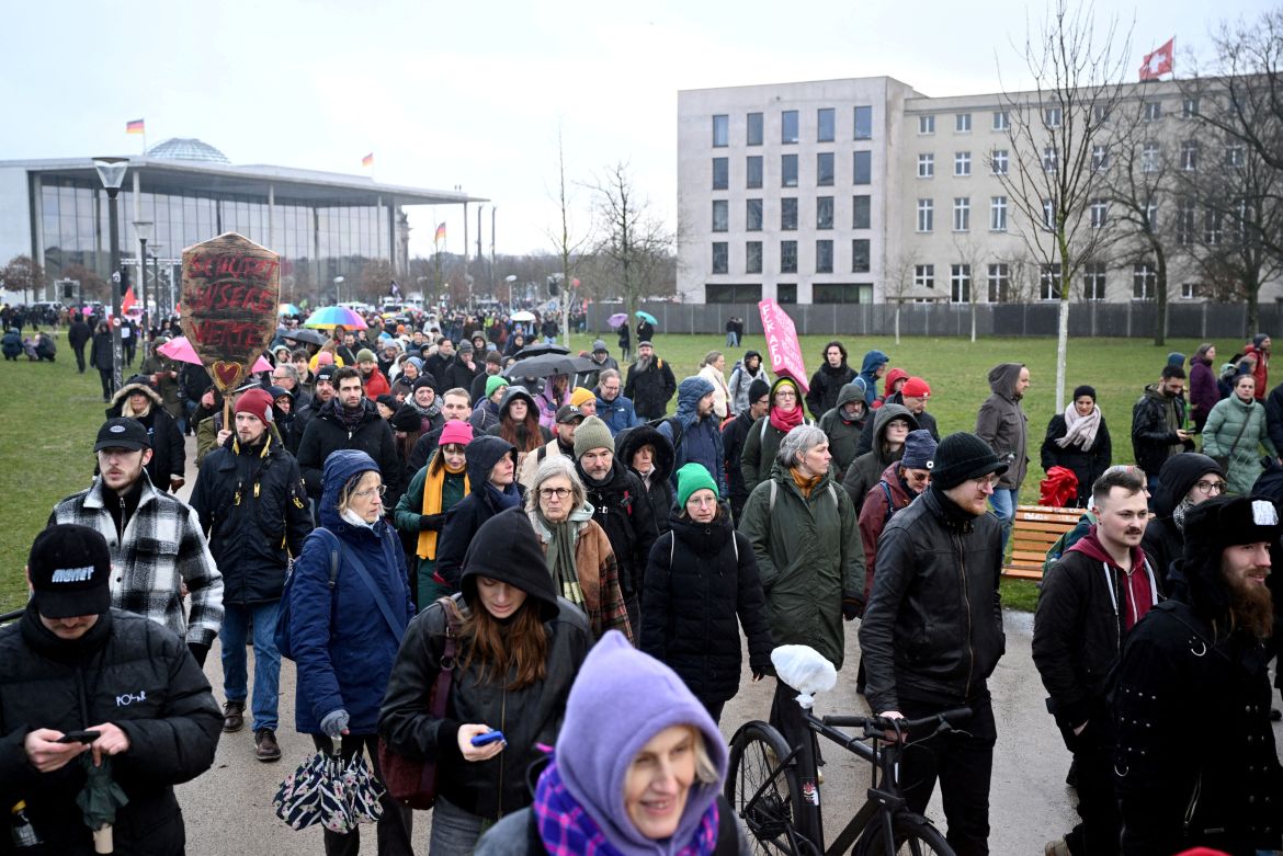 People leave after gathering during a rally of the broad alliance "Hand in Hand" under the slogan "Wir sind die Brandmauer" ("We are the Firewall") to protest against right-wing extremism and for the protection of democracy, in Berlin, Germany February 3