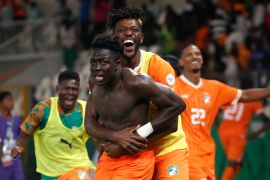 Ivory Coast's Oumar Diakite celebrates scoring their second goal with teammates