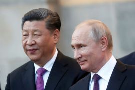 Chinese President Xi Jinping and Russian President Vladimir Putin attend a presentation, at the Kremlin in Moscow, Russia, June 5, 2019. [Maxim Shipenkov/Pool via Reuters/File Photo]