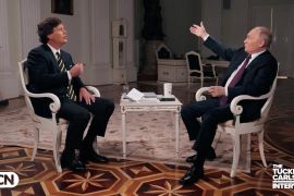 Russian President Vladimir Putin speaks during an interview with US television host Tucker Carlson in Moscow