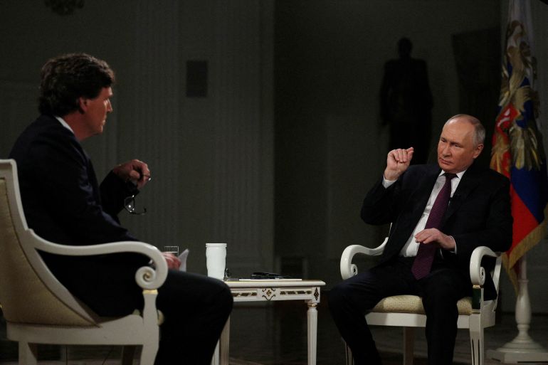 Russian President Vladimir Putin speaks during an interview with U.S. television host Tucker Carlson in Moscow, Russia February 6, 2024. Sputnik/Gavriil Grigorov/Kremlin via REUTERS ATTENTION EDITORS - THIS IMAGE WAS PROVIDED BY A THIRD PARTY.