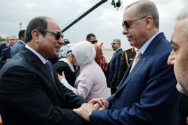 Turkey’s President Tayyip Erdogan is welcomed by Egypt's President Abdel Fattah al-Sisi at the airport in Cairo, Egypt