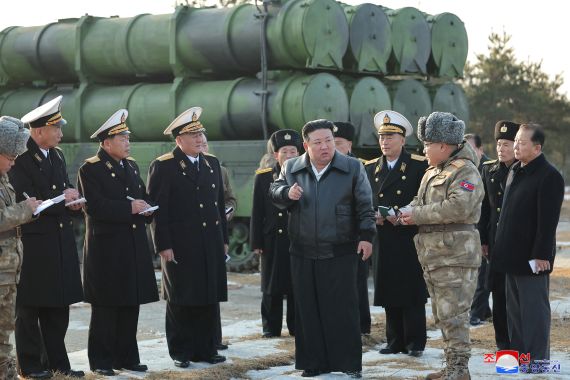 North Korean leader Kim Jong Un attends an inspection test of a new surface-to-sea missile, at an undisclosed location in North Korea.