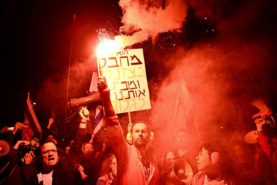 People attend a protest against Israeli Prime Minister Benjamin Netanyahu's government, amid the ongoing conflict between Israel and the Palestinian Islamist group Hamas, in Tel Aviv, Israel, February 17