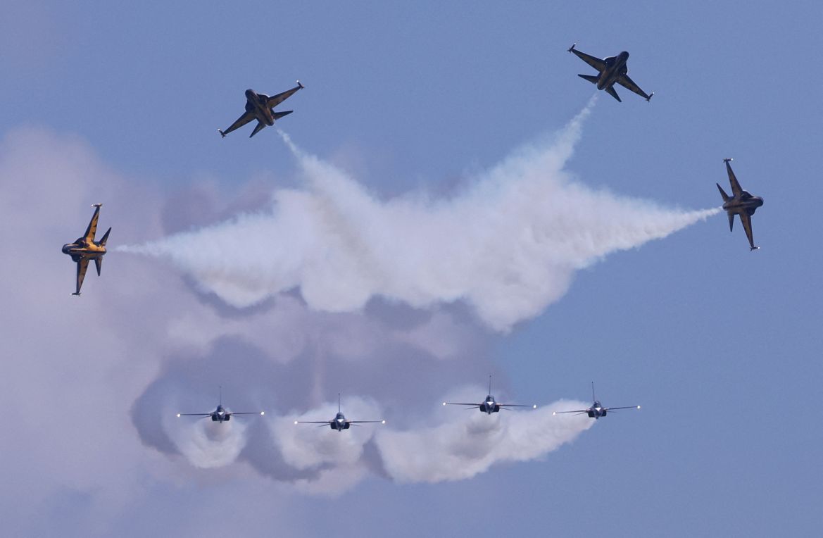 Republic of Korea Air Force's Black Eagles perform during an aerial flying display ahead of the Singapore Airshow at Changi Exhibition Centre in Singapore February 18
