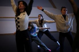 Marharyta Chykalova, 16, from Kherson, dances during a stage movement class at the Atelier Theatre in Sopot, Poland. [Kacper Pempel/Reuters]