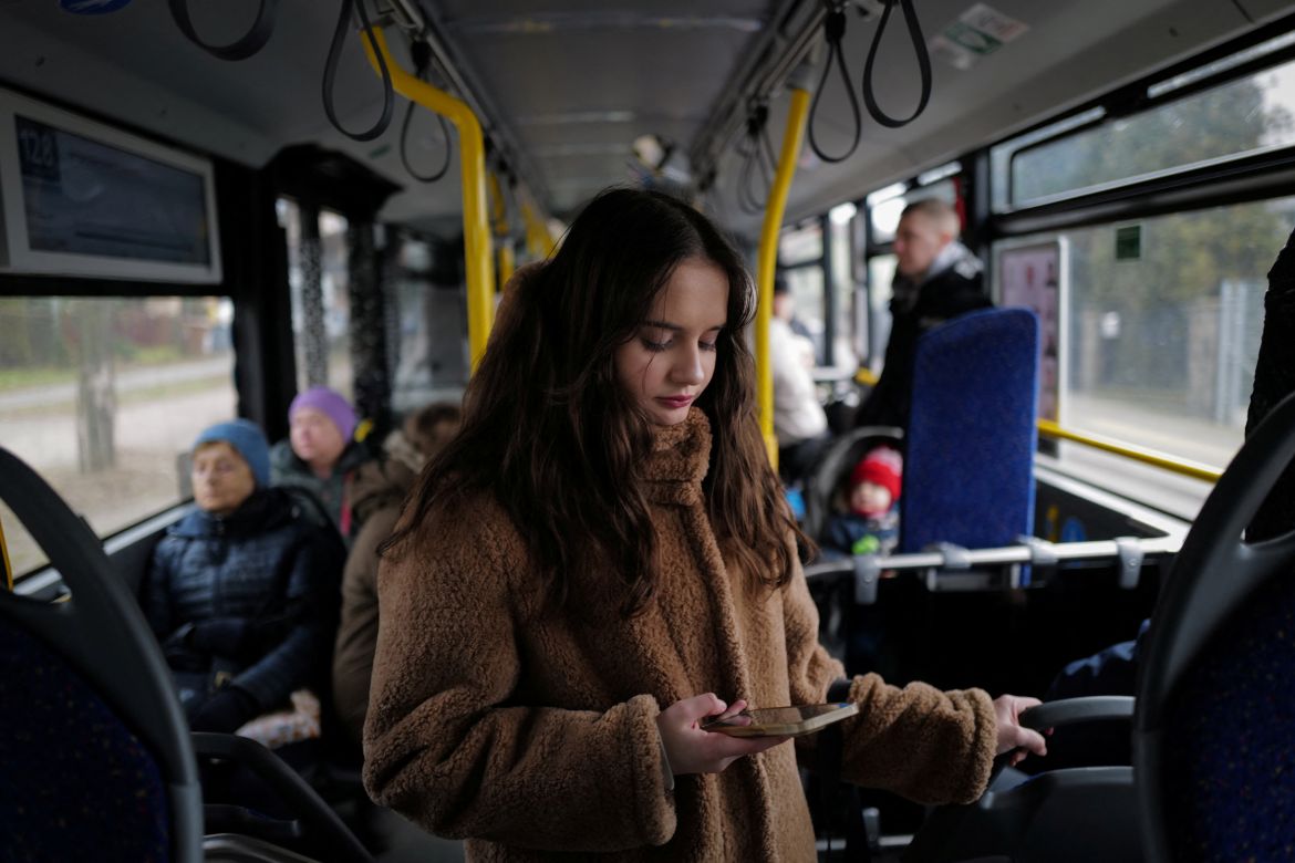 Marharyta Chykalova, 16, from Kherson, rides a bus to theatre classes, in Gdynia, Poland, February 17