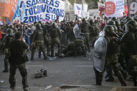 Argentine police battle protesters opposed to sweeping reform bill