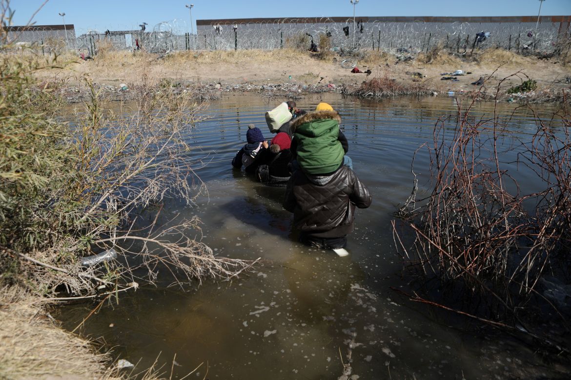Migrants try to cross the Rio Bravo/Grande from Ciudad Juarez, state of Chihuahua, Mexico on February 12