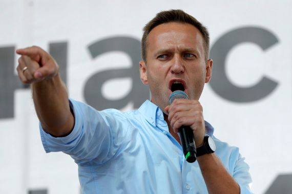 FILE - Russian opposition activist Alexei Navalny gestures while speaking to a crowd during a political protest in Moscow, Russia on July 20, 2019. Associates of imprisoned Russian opposition leader Alexei Navalny say he has been located at a prison colony above the Arctic Circle nearly three weeks after contact with him was lost. Navalny, the most prominent foe of Russian President Vladimir Putin, is serving a 19-year sentence on charges of extremism. (AP Photo/Pavel Golovkin, File)