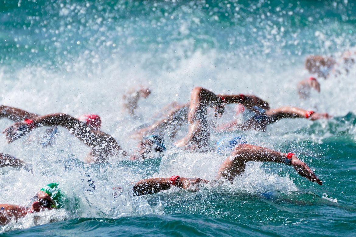 Athletes compete in the men's 10 km open water final at the World Aquatics Championships in Doha, Qatar, Sunday, Feb. 4