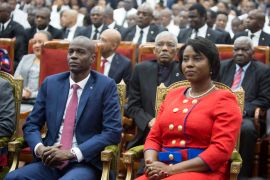 Haiti&#039;s assassinated former President Jovenel Moise sits with his wife Martine during his swearing-in ceremony in parliament in Port-au-Prince, Haiti, February 7, 2017 [Dieu Nalio Chery/AP Photo]