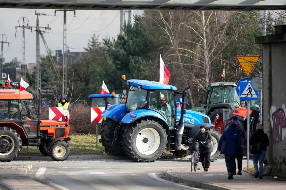 Polish farmers drive tractors in a convoy as they intensify a nationwide protest against the import of Ukrainian foods and European Union environmental policies, in Minsk Mazowiecki, Poland, on Tuesday Feb. 20, 2024. Farmers across Europe have been protesting recently, worried that EU plans to place limits on the use of chemicals and on greenhouse gas emissions will result in a reduction in production and income. They are also in revolt against competition from non-EU countries, in particular Ukraine. (AP Photo/Czarek Sokolowski)