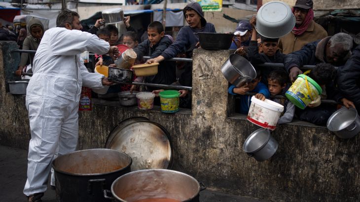 Palestinians line up for food in Rafah, Gaza Strip, Feb. 23, 2024