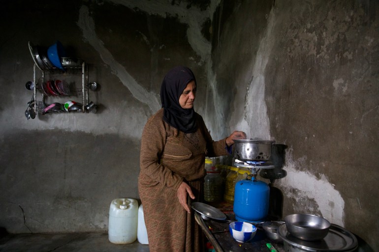 After spending a lot of money on repairing the house, Abdul Karim’s wife was able to use her kitchen to a limited extent to cook food and move it to the tent where her family resides.
