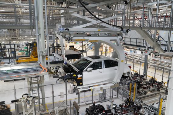 A Bayerische Motoren Werke AG (BMW) Series 3 vehicle moves along the production floor of the company's manufacturing facility in San Luis Potosi, Mexico