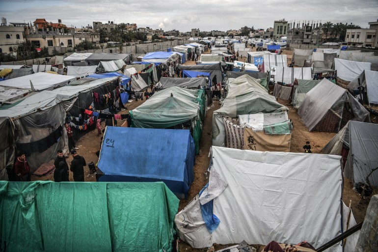 A general view from the makeshift tents where Palestinian families taking shelter